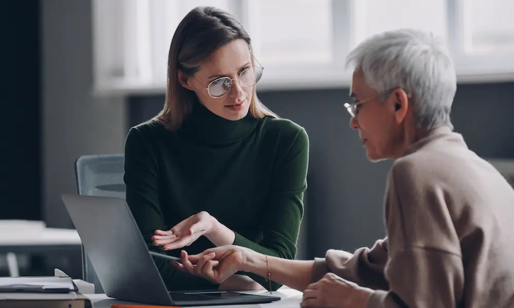 Navigating-a-Challenging-Market-3-Steps-to-Help-You-Manage-Your-Personal-Insurance-Renewals-with-McConkey-Insurance-Benefits-Client-Discussing-Insurance-With-Thier-Agent